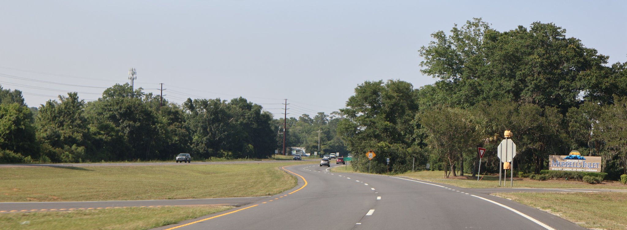 Murrells Inlet welcome sign beside U.S. Route 17 in South Carolina.